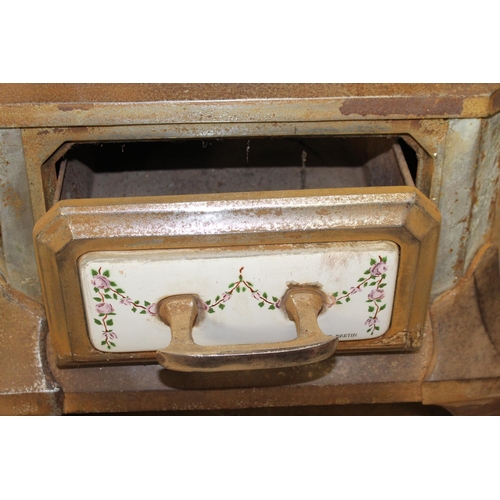 255 - Late 19th C. enamelled cast iron barge stove.