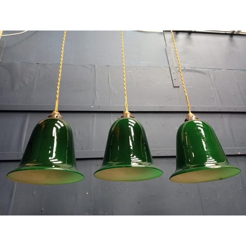 275 - Three glass industrial bell style lights with brass galleries. {H 30cm x Dia 25cm}.