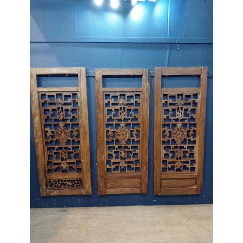 294 - Three oriental lattice and carved wood dividers. {Each panel H 145cm x W 60cm x D 4cm }.