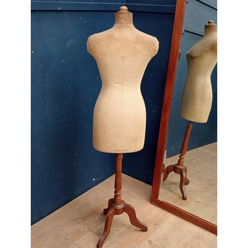 312 - 1920's Mannequin on adjustable wooden stand. {H 160cm x W 44cm x D 26cm }.