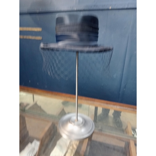 320 - 1930's Metal hat stand with ladies hat. {H 50cm x W 28cm x D 34cm }.