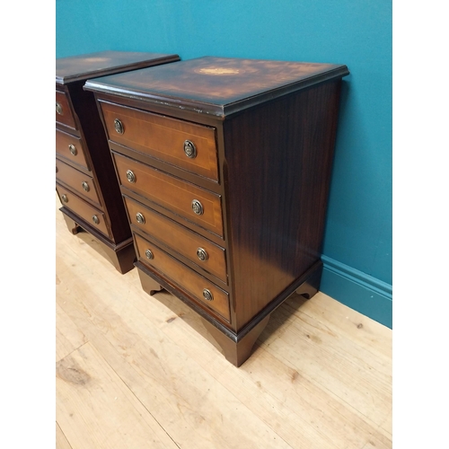 327 - Pair of good quality mahogany and satinwood inlaid bedside cabinets with four drawers raised on brac... 