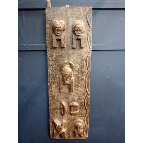33 - 18th C. African carved wooden granary Baule door. {H 126cm x W 39cm x D 6cm }.