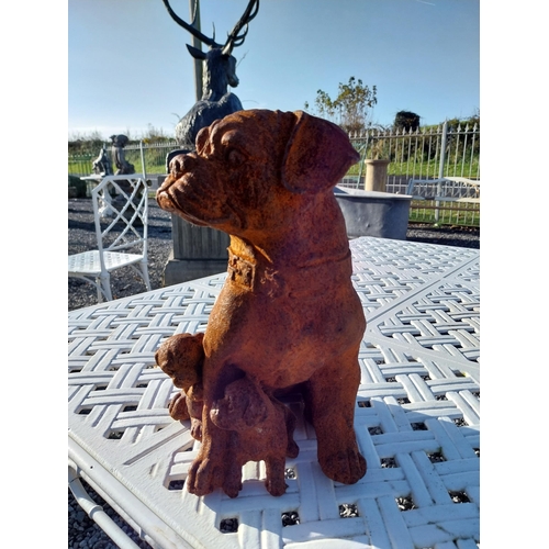 330 - Cast iron model of Pug dog with pups. {30 cm H x 25 cm W x 30 cm D}.