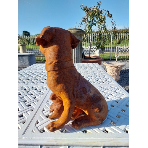 330 - Cast iron model of Pug dog with pups. {30 cm H x 25 cm W x 30 cm D}.