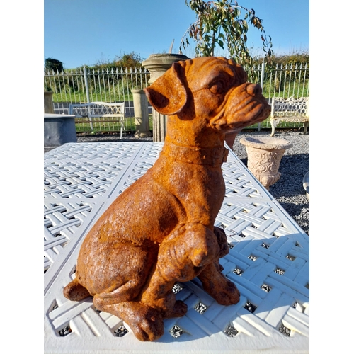 330 - Cast iron model of Pug dog with pups. {30 cm H x 25 cm W x 30 cm D}.