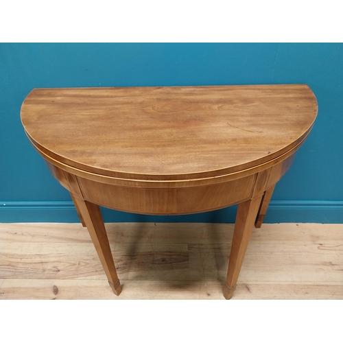 337 - Georgian mahogany and satinwood inlaid demi lune turn over leaf card table raised on square tapered ... 