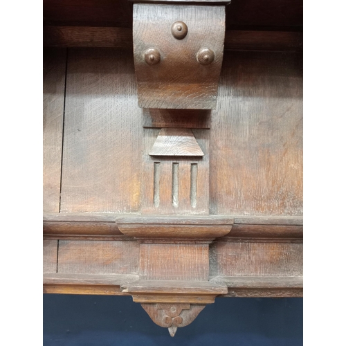 354 - Oak carved fireplace mantle in the Arts and Crafts manner. {H 52cm x W 167cm x D 56cm}.