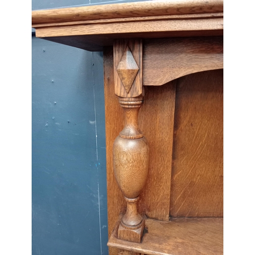 363 - Edwardian oak fire surround. {H 152cm x W 146cm x D 22cm}.