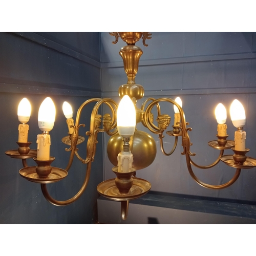 38 - Good quality decorative eight branch gilded brass chandelier. {H 100cm x Dia 90cm }.