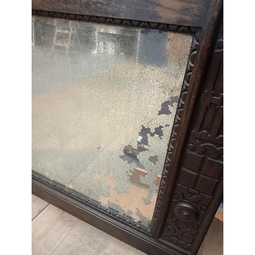 381 - Victorian Oak overmantle with distressed mirrored glass {H 185cm x W 153cm x D 38cm }.