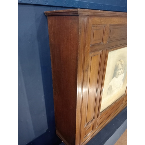 383 - 19th C. Oak overmantle with child portrait insert. {H 121cm x W 126cm x D 34cm }.