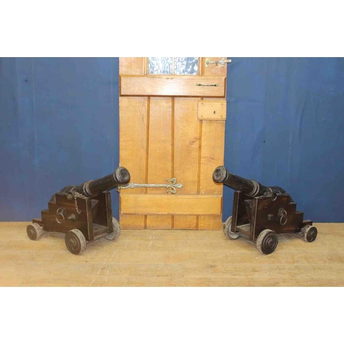 403 - Pair of 19th C. Cast iron deck cannons. {H 61cm x W 39cm x D 73cm }.