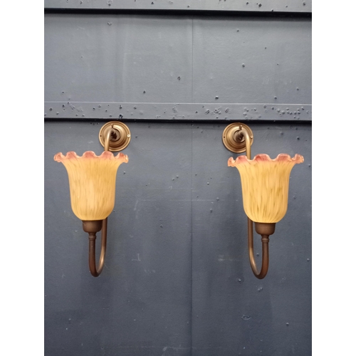 406 - Two brass wall light with tulip shades {H 25cm x W 37cm x D 19cm }.