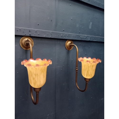 406 - Two brass wall light with tulip shades {H 25cm x W 37cm x D 19cm }.