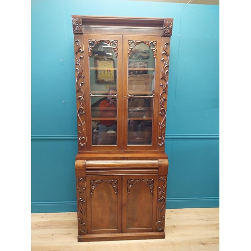 407 - William IV carved mahogany bookcase of neat proportions with two glazed doors over singe drawer over... 