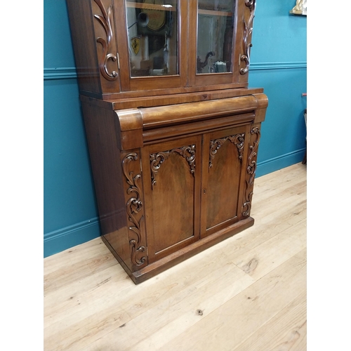 407 - William IV carved mahogany bookcase of neat proportions with two glazed doors over singe drawer over... 