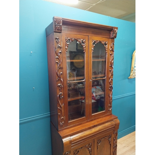 407 - William IV carved mahogany bookcase of neat proportions with two glazed doors over singe drawer over... 