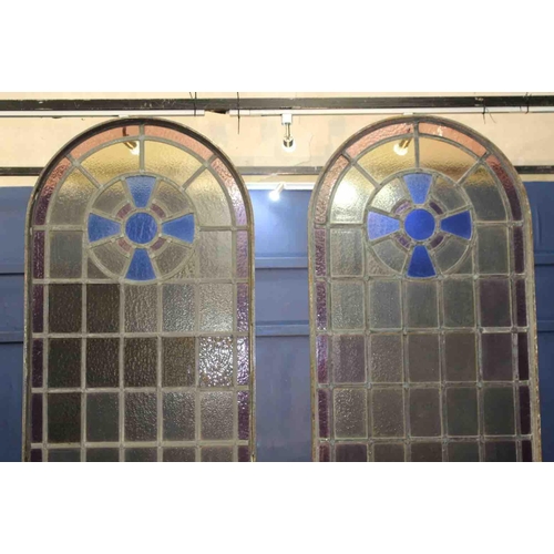 409 - Pair of Victorian arched wrought iron leaded glass windows with opening to bottom. {each H 228cm x W... 