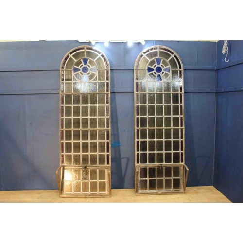 409 - Pair of Victorian arched wrought iron leaded glass windows with opening to bottom. {each H 228cm x W... 