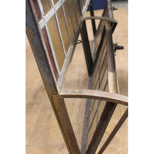 409 - Pair of Victorian arched wrought iron leaded glass windows with opening to bottom. {each H 228cm x W... 