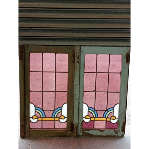 410 - Pair of Art Deco stain glass leaded windows {H 80cm x W 93cm x D 5cm}.