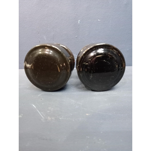 416 - Pair of black ceramic door knobs. {D 7cm x Dia 7cm}.