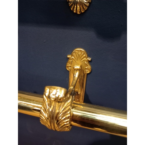 419 - Pair of brass curtain rails with acanthus leaf design {Each H 16cm x W 124cm x D 14cm}.