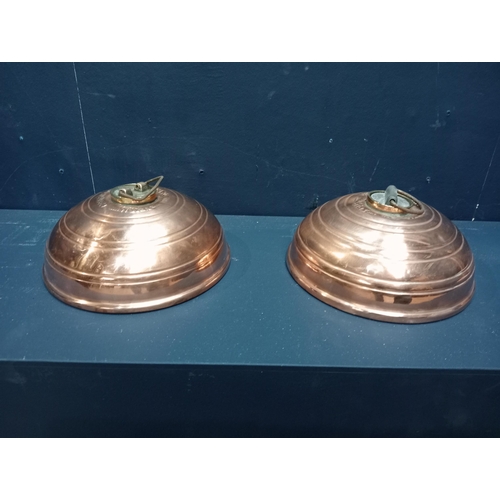 430 - Pair of copper foot warmers {H 10cm x Dia 21cm}.