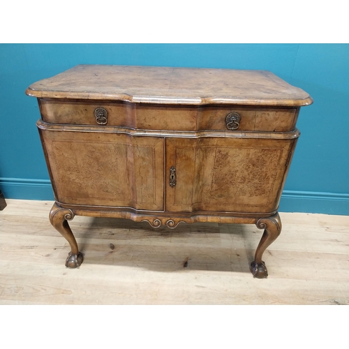 437 - Good quality 19th C. walnut side cabinet with single drawers over two doors raised on cabriole legs ... 