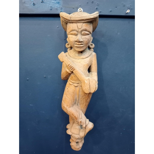 444 - Pair of wooden carved figures. {H 50cm x W 10cm x D 15cm }.