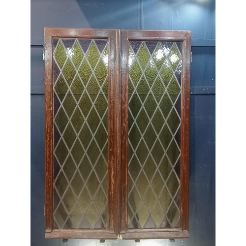 451 - Pair of leaded stain glass lattice windows {H 168cm x W 108cm x D 7cm}.