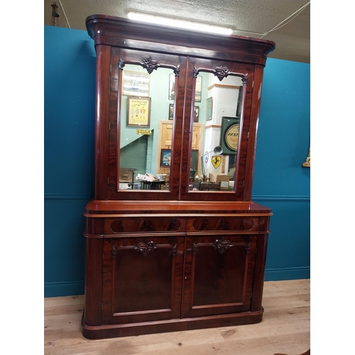 457 - Exceptional quality Victorian flamed mahogany bookcase with two mirrored doors above two drawers abo... 