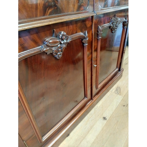 457 - Exceptional quality Victorian flamed mahogany bookcase with two mirrored doors above two drawers abo... 