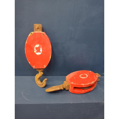 481 - Pair of red ships metal  pulleys {H 48cm x W 18cm x D 9cm }.