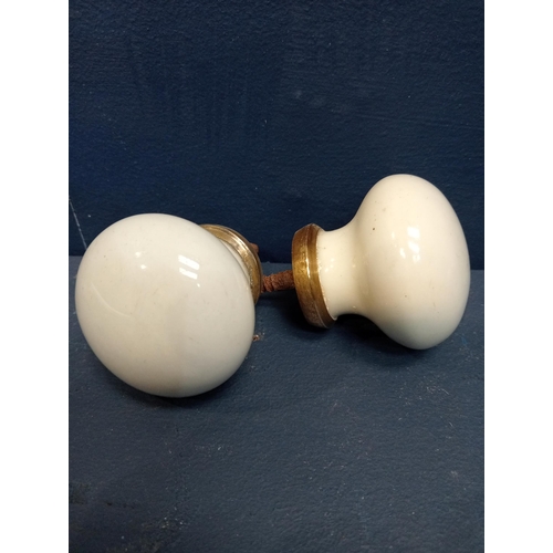 491 - Pair of white ceramic door knobs {D 5cm x Dia 5cm}.