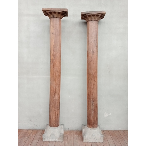 492 - Pair of 19th C. wooden columns with stone base {H 248cm x W 44cm x D 39cm}.