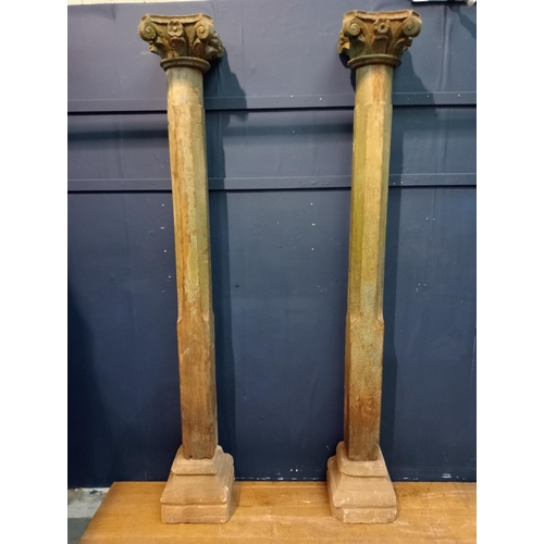 493 - Pair of wooden pillars with Corinthian wood top on sandstone base {H 220cm x W 30cm x D 30cm }.