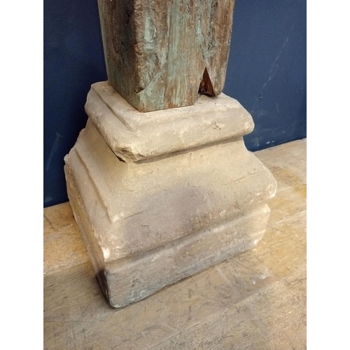 493 - Pair of wooden pillars with Corinthian wood top on sandstone base {H 220cm x W 30cm x D 30cm }.