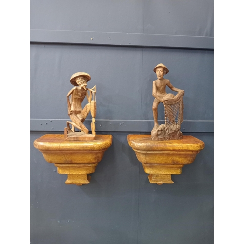 494 - Pair of wooden wall sconces decorated with corbels {H 23cm x W 28cm x D 17cm }.