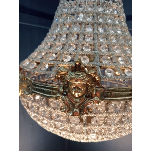 496 - Pear drop Crystal and  bronze six light chandelier {H 100cm x Dia 60cm}.