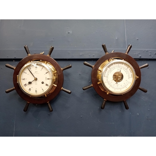 539 - Schulz compensated barometer and matching clock in ships wheel surround {D 10cm x Dia 33cm }.