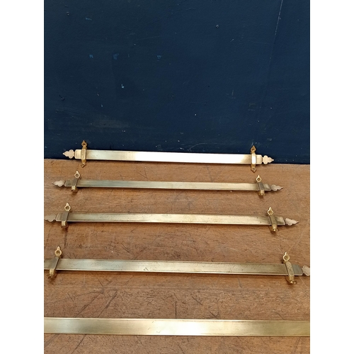 542 - Set of eleven Victorian brass stair rods  {H 3cm x W 56cm x D 3cm }.