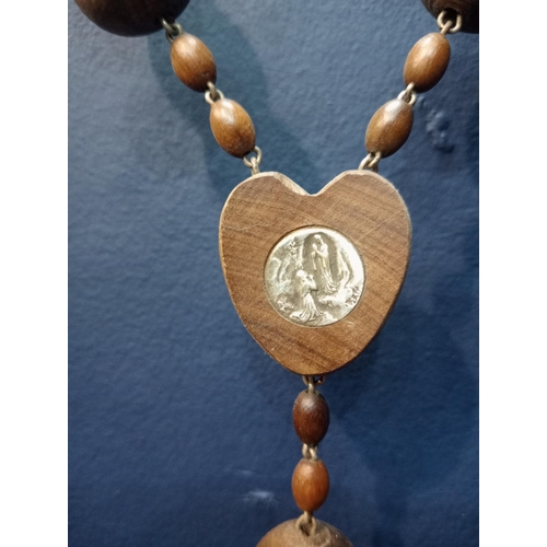 554 - Set of olive wood rosary beads with our Lady's apparition at Lourdes inset {H 105cm x W 9cm}.