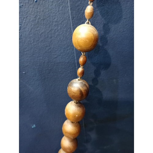 554 - Set of olive wood rosary beads with our Lady's apparition at Lourdes inset {H 105cm x W 9cm}.