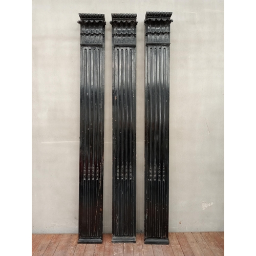 555 - Set of three 1900's fluted flat pillars with acanthus leaf design {H 276cm x W 32cm x D 12cm}.