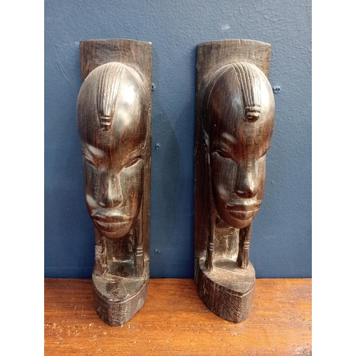 558 - Set of two African ebony wood carved figures {H 24cm x W 7cm x D 8cm }.