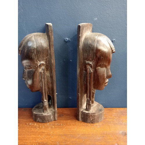 558 - Set of two African ebony wood carved figures {H 24cm x W 7cm x D 8cm }.