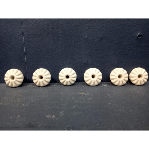 561 - Six ceramic floral cabinet knobs {Dia 2cm x D 2cm}.