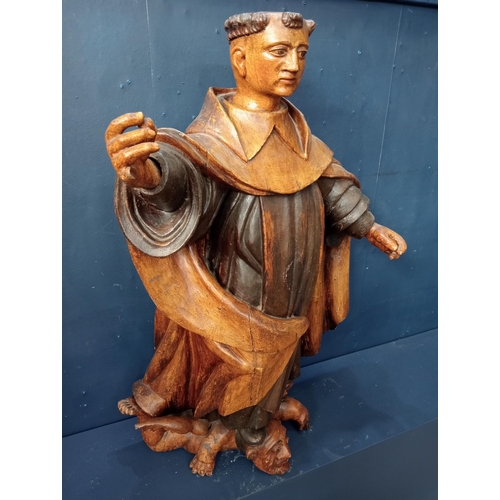 564 - Solid wooden 18th C. religious figure of St Anthony conquering the demons shown under his feet {H 88... 